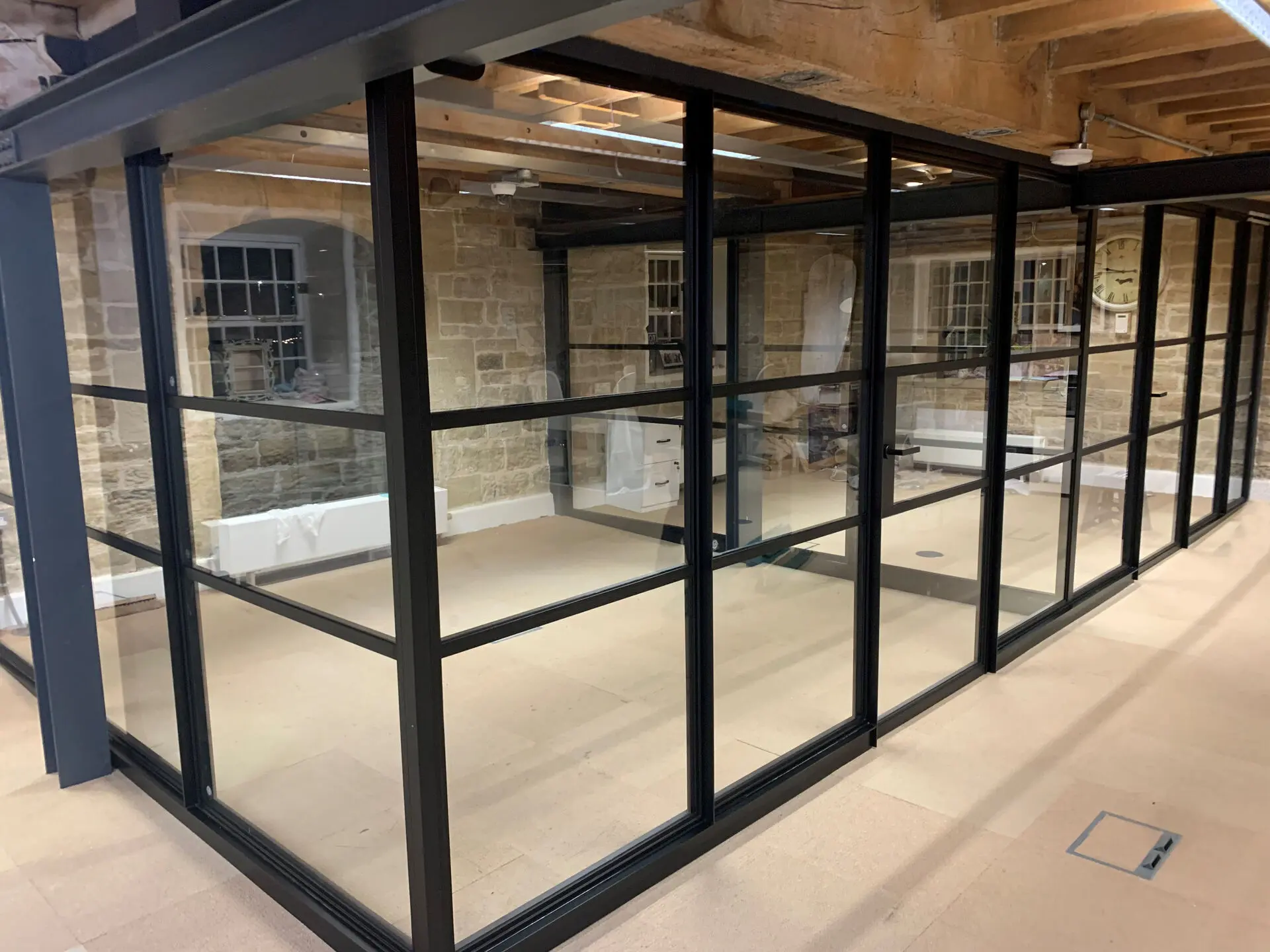 Glass partition screen in modern interior